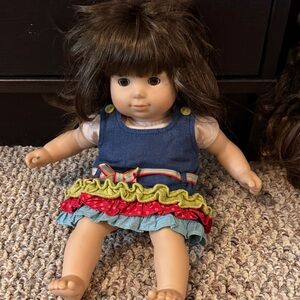 American Girl Doll in Blue Dress with Red and Green Ruffles